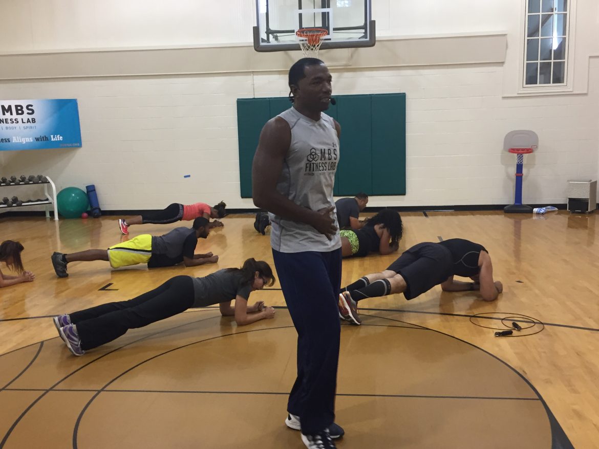 Core exercises with group in gym